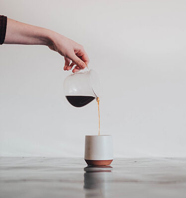 coffee being poured into a cup