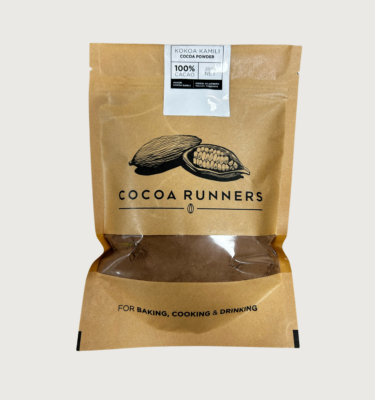 Picture of cocoa runners unsweetened 100% cocoa powder on a grey background. The bag is brown with a see through strip where you can see the powder.