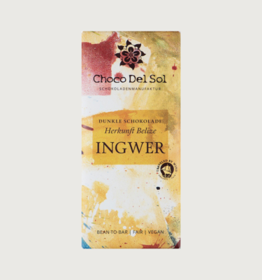 Picture of Choco del sol's Ginger bar on a grey background. The packaging is yellow, white, and red with a yellow label.