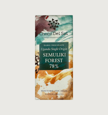 Picture of Choco del sol's Uganda dark bar on a grey background. The packaging is abstract, and is white, orange, deep cool purple and teal, with a dark teal label.