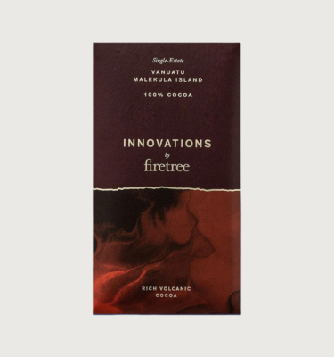 A picture of firetree's vanuatu 100% bar on a grey background. The bar is black, with a red and black smoky pattern on it's bottom half. The writing is in gold